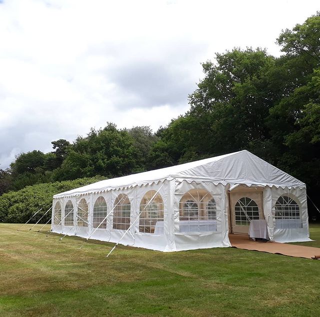 6x12m DIY Marquee with linings, carpet flooring, and furniture