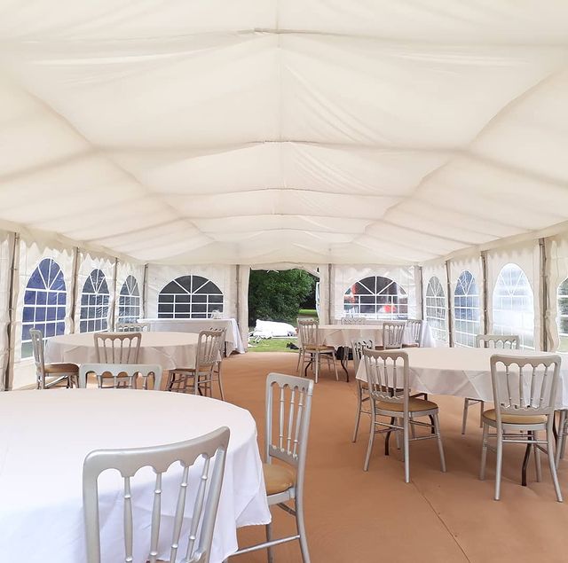 6x12m Marquee interior with linings, carpet flooring, and furniture