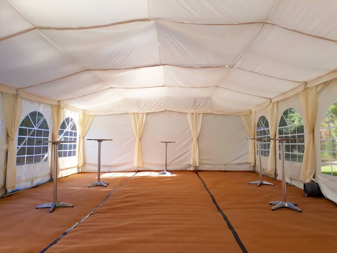 Inside 6x10m marquee with roof and curtain linings