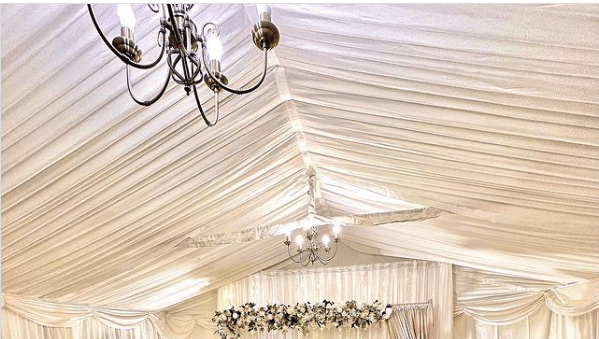 Marquee with pleated roof linings and swags