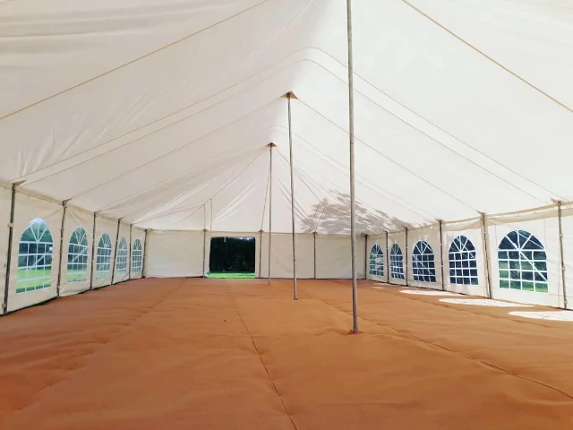 beige carpet in a 9x18m traditional marquee
