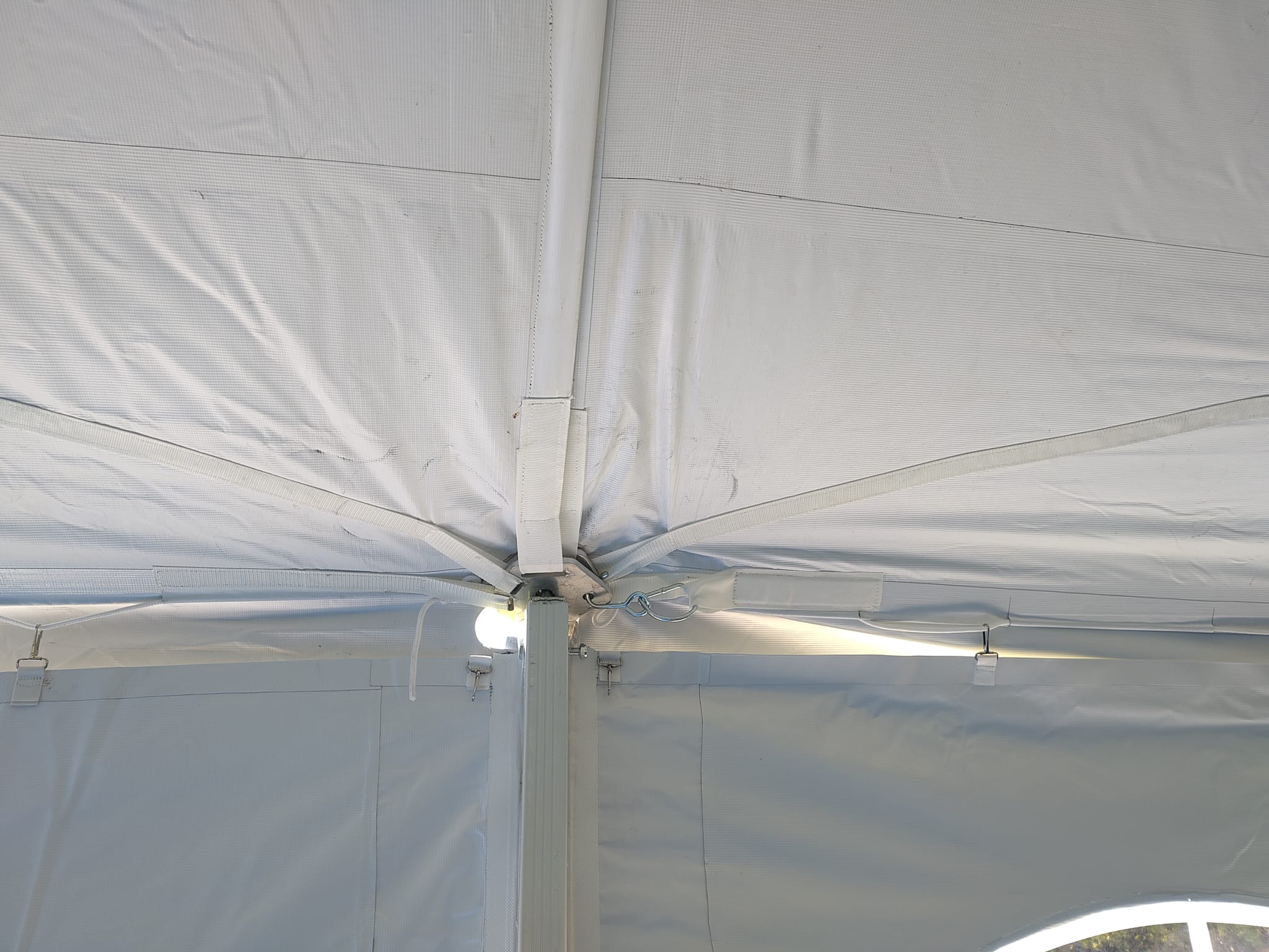Inside the traditional marquee roof where the leg joins the roof